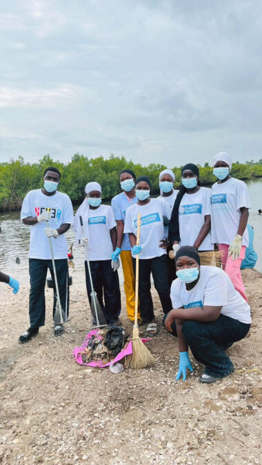 First-time Meetup Host Aminata B Sowe leading a group of volunteers for her WATER Meetup at Bafuloto River Side in Farato, The Gambia to help combat illegal dumping of waste.