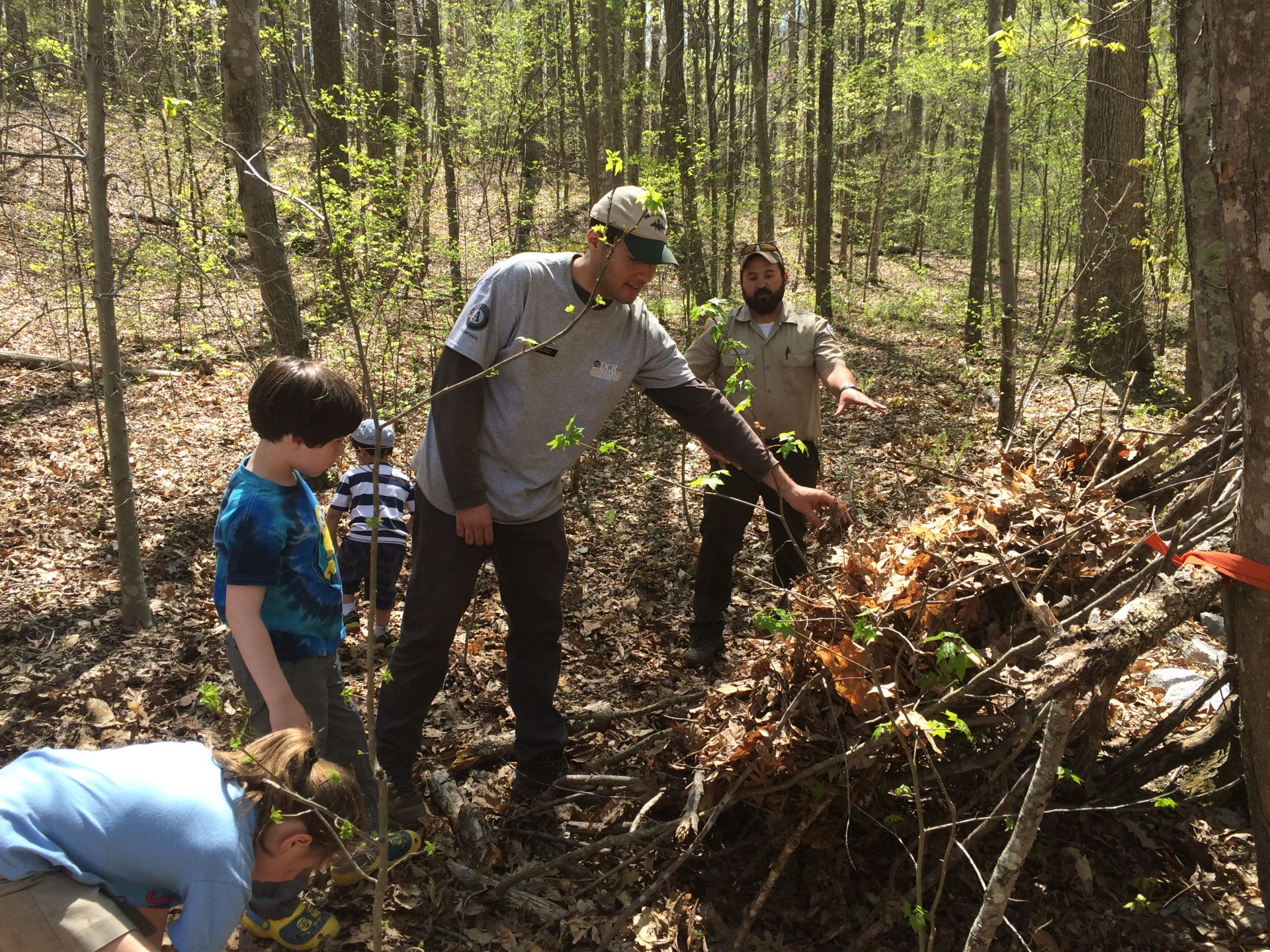 Mentor showing students survival techniques.