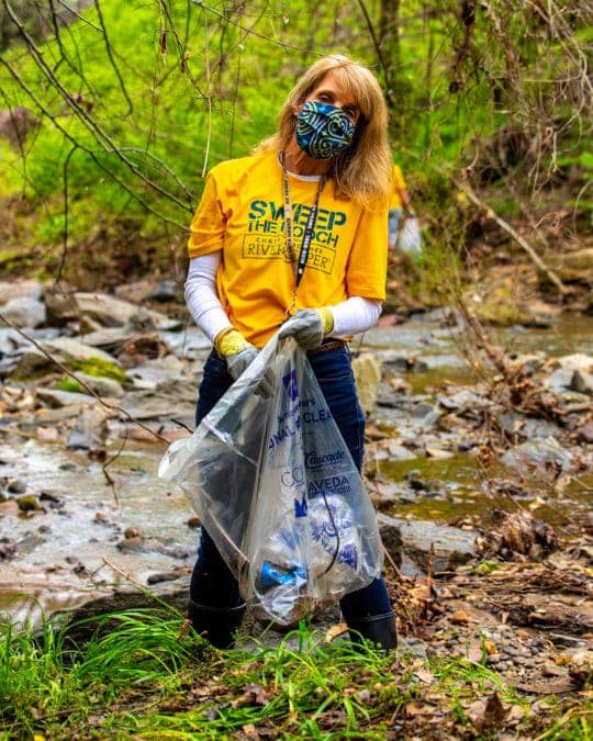 Laura Turner Seydel conducting stream cleanup