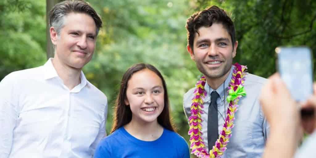 Henry Pincus, Adrian Grenier, and Chloe Mei smiling for photo