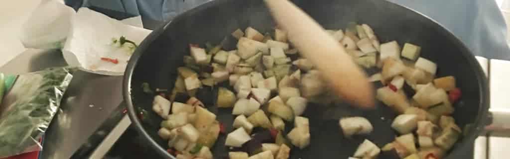 Cooking vegetables in pan