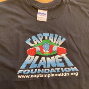 A black cotton t-shirt with the vintage logo of Captain Planet Foundation