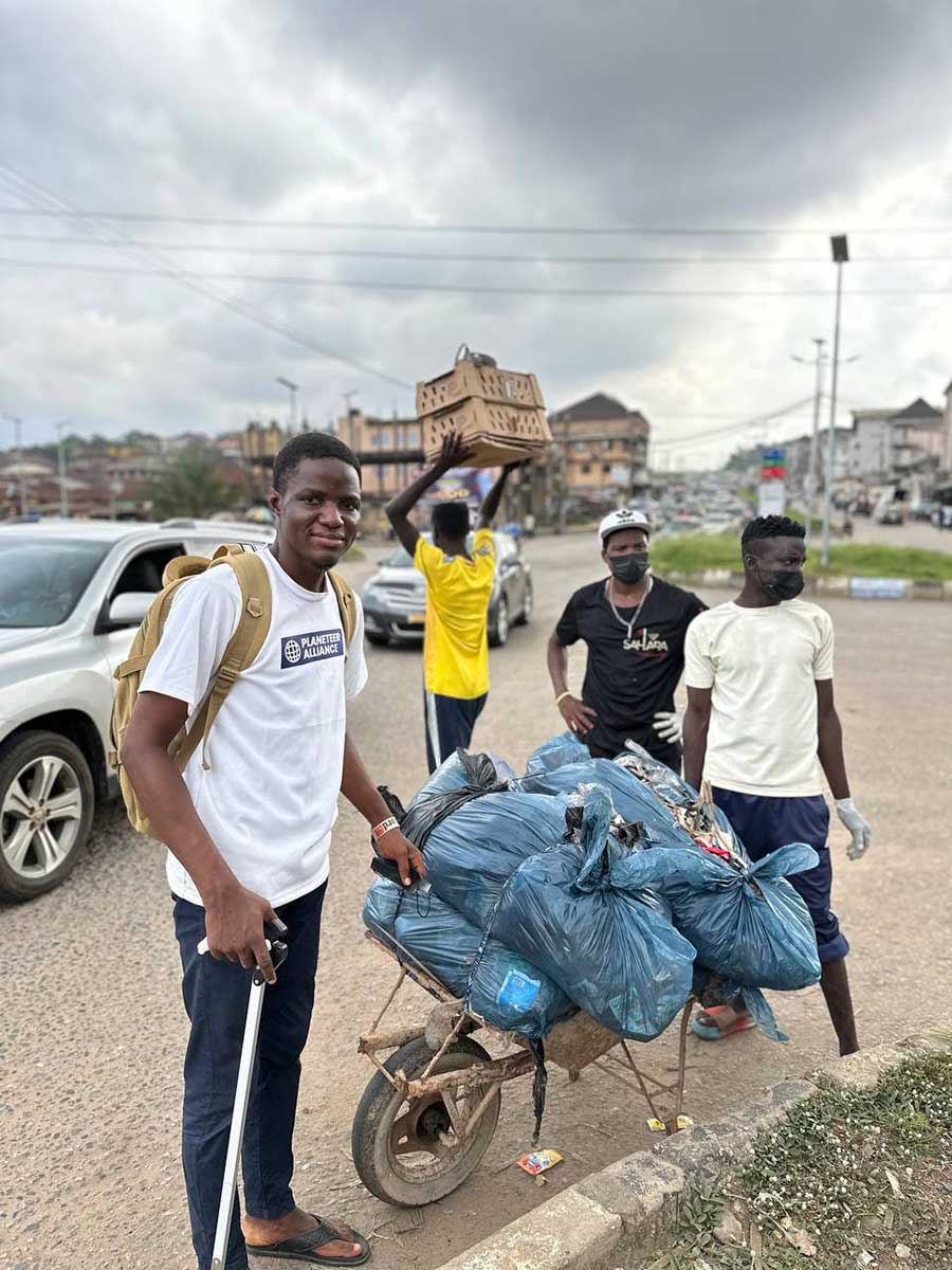 Michael Adefioye from Ogun State, Nigeria collected 520kg of waste at his local river, followed by a native tree planting activity at three nearby secondary schools.