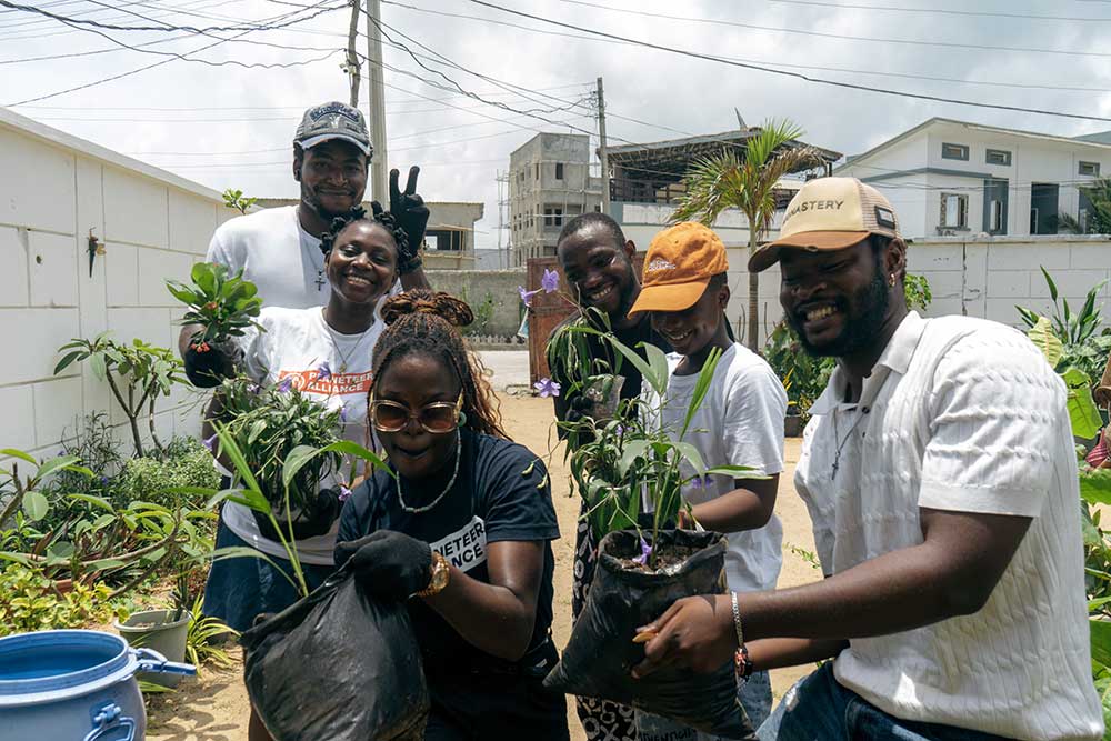 Victoria Participants with seedlings they planted