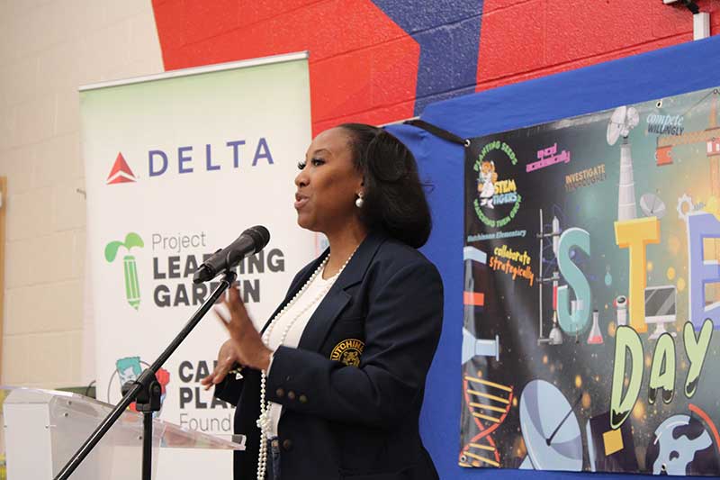 Principal Melissa St. Joy addresses Emma Hutchison Elementary STEM Day volunteers