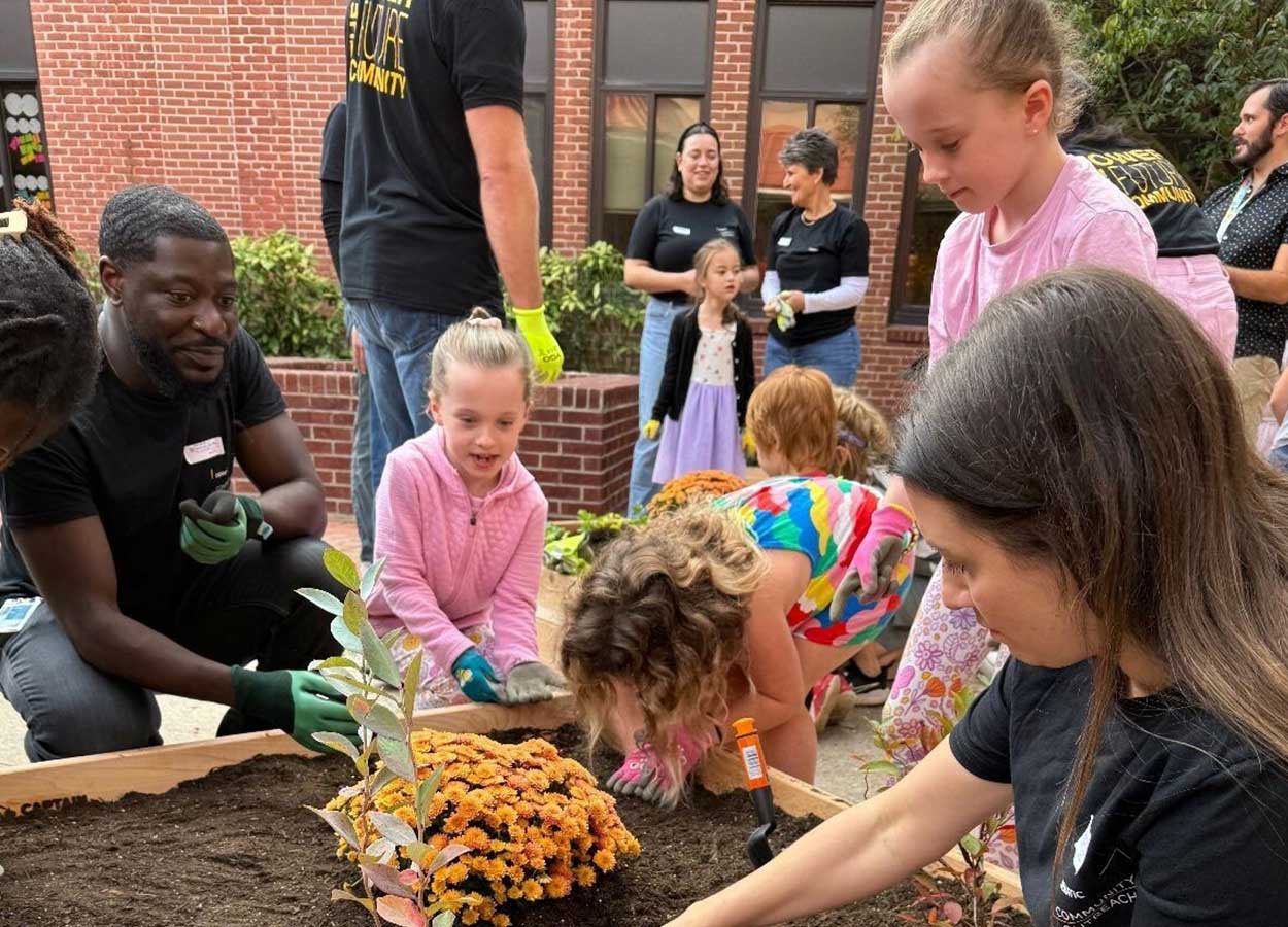 Project Learning Garden Students and a Garden Bed