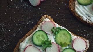 Cucumbers and radishes on a sandwhich