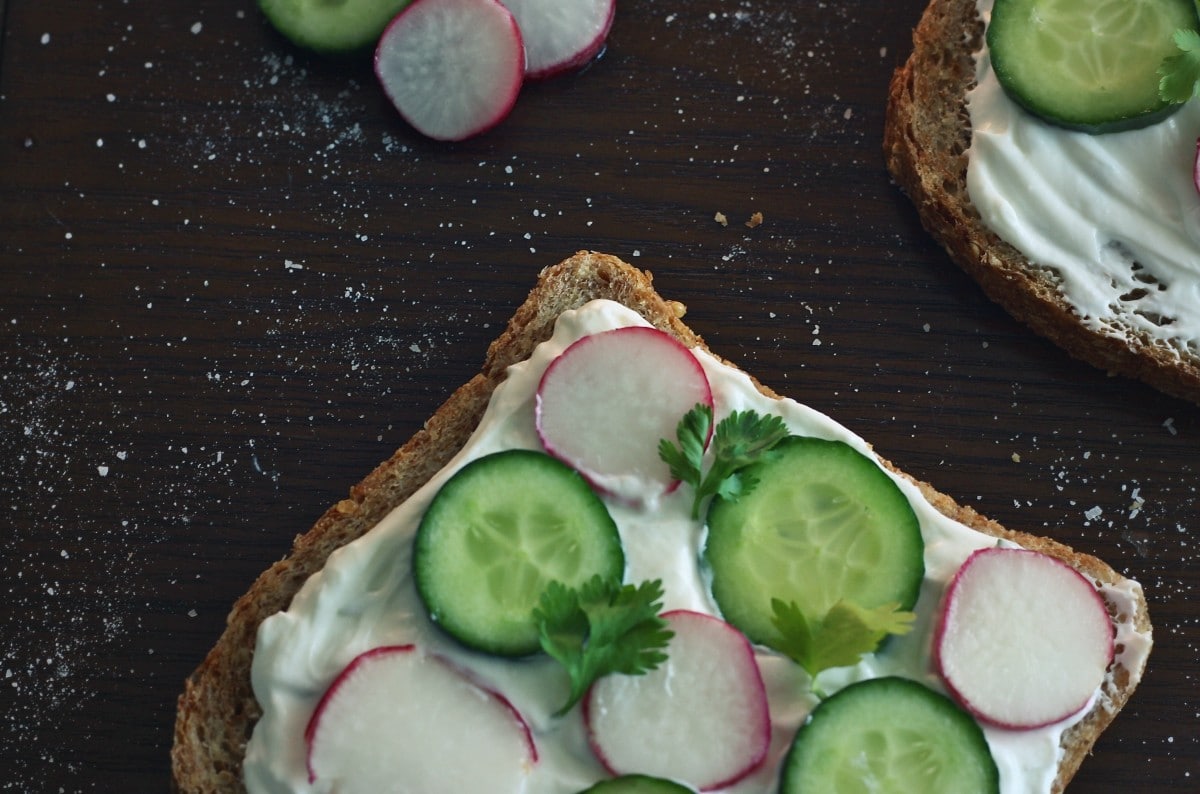 Cucumbers and radishes on a sandwhich